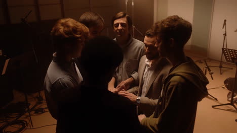 Group of men in a recording studio