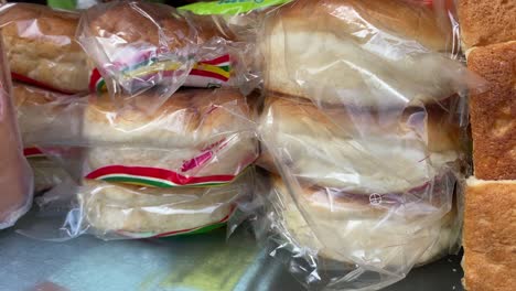 close up shot of bun bread sold in the store of kolkata in the morning time