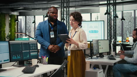 vertical video diverse workers team use digital tools and analytics to improve growth strategy