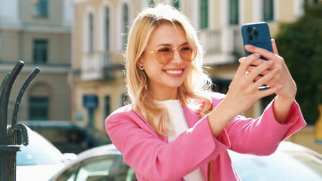 woman taking a selfie outdoors