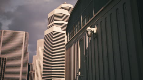 modern skyscrapers rise against a cloudy sky in an urban setting