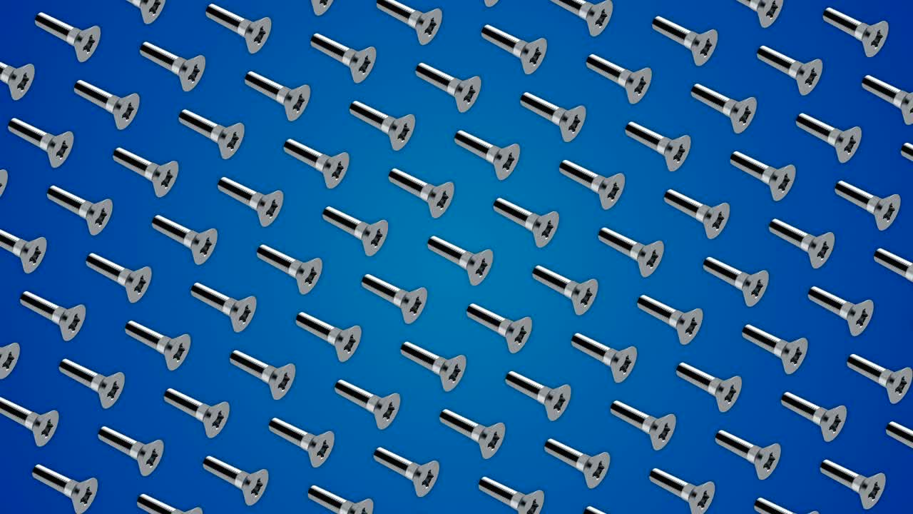 los tornillos metálicos, los pernos, el patrón, el bucle de fondo azul
