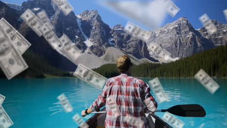 animation of american dollar bills falling over caucasian man canoeing on lake