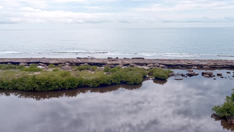 Los-Cuadritros-beach-and-lagoon-with-mangroves,-San-Cristobal-in-Dominican-Republic