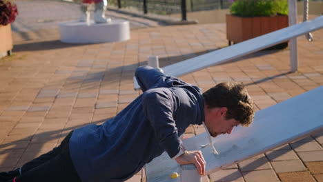 man doing push-ups outdoors