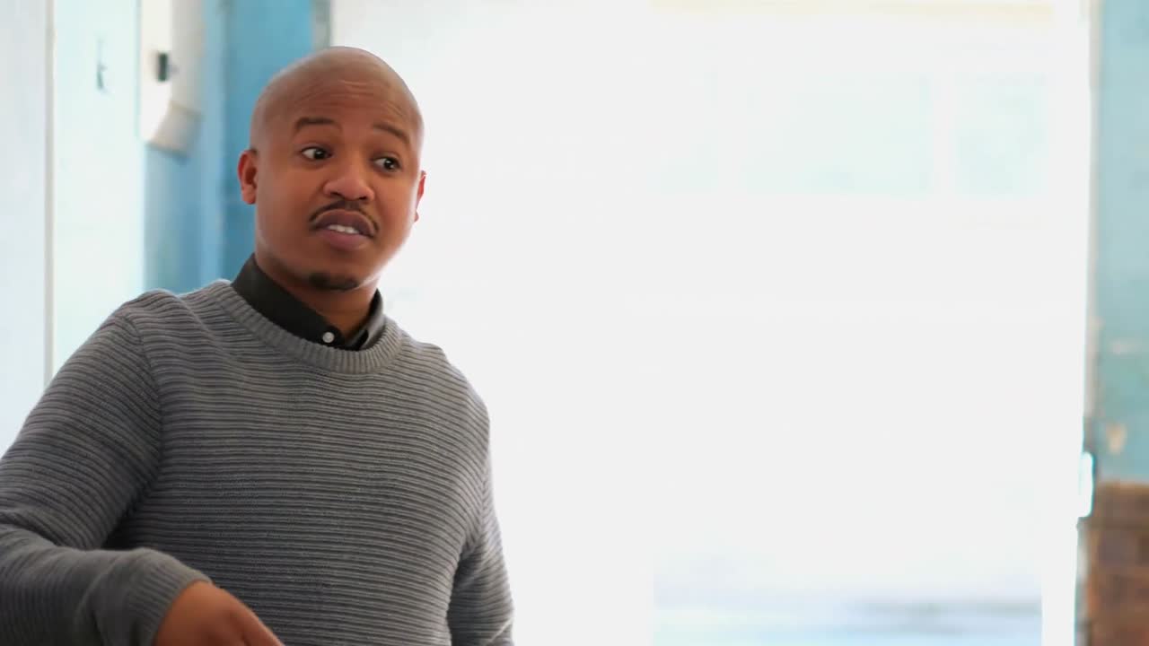 Male teacher teaching students in the classroom 4k