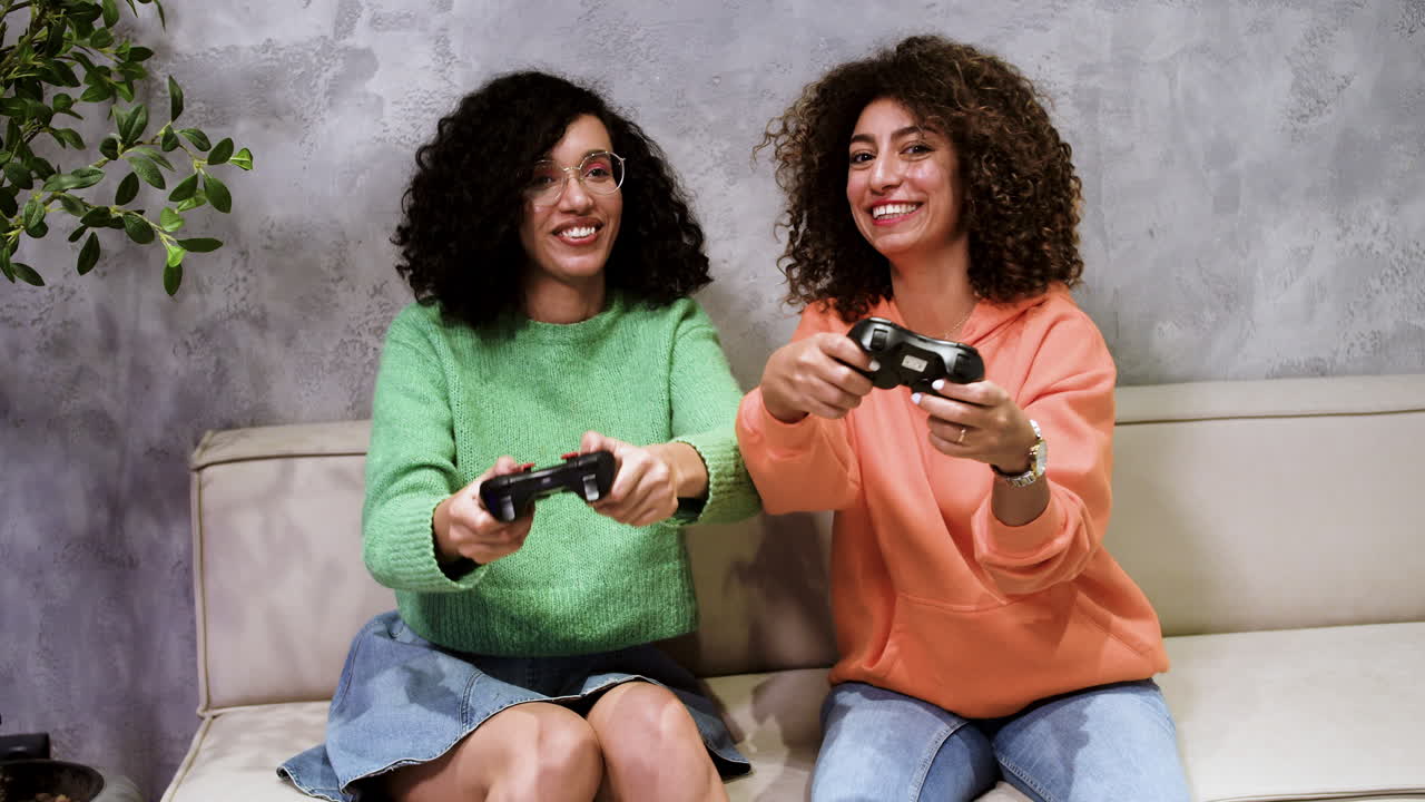 Friends playing videogames