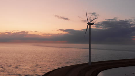 windturbines during sunset on the island neeltje jans, the netherlands