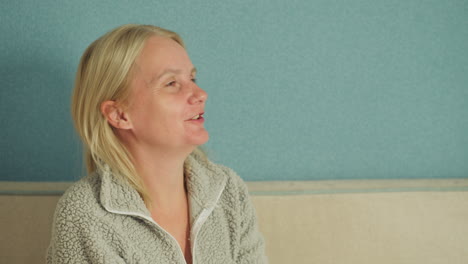 woman relaxing on couch