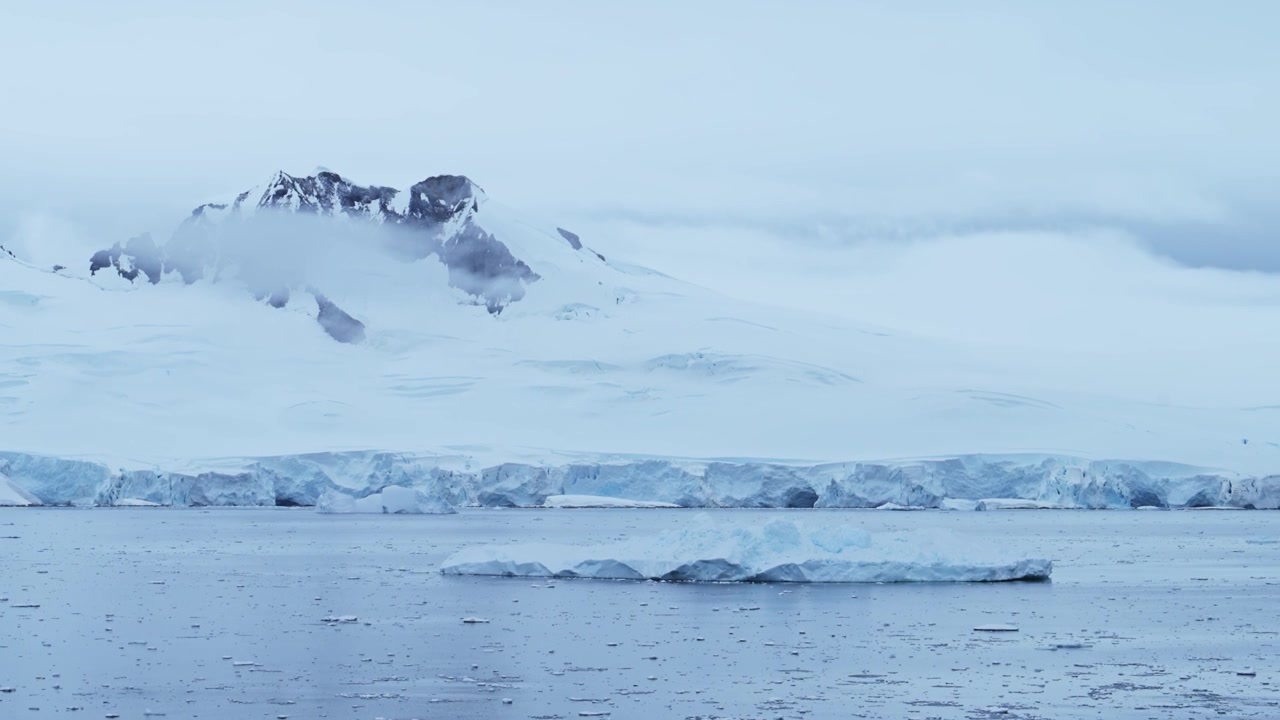 Winter Ocean Landscape in Antarctica Iceberg Mountains and Sea, Beautiful Dramatic Blue Coastal Landscape and Seascape on Antarctic Peninsula Coast, Icy Winter Sea Scene with Ice