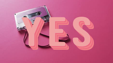 animation of yes text over tape on pink background