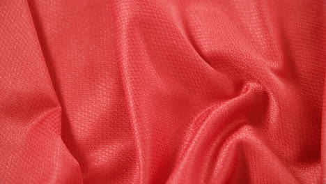 Close-up-of-football-red-jersey-fabric-4k