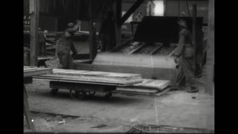 the workings of a lumber mill in 1918 spray painting is introduced