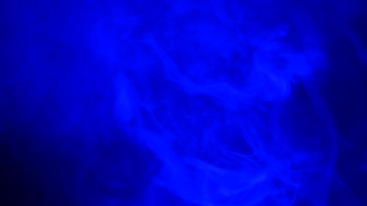 Ambient, abstract, sci fi, ethereal blue smoke and light motion background for mystical, dreamlike, background atmosphere with calm, serene slow motion fog and moving smoke and light.