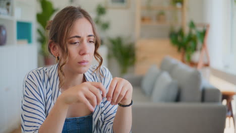 Depressed-Businesswoman-Holding-Pen-in-Hands-Sad