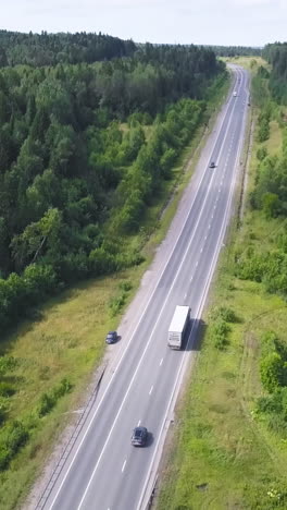 highway through forest landscape