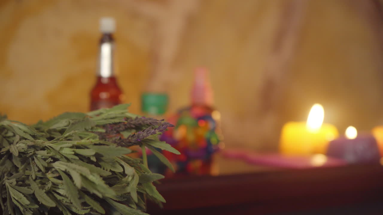 Medicinal plants and lavender in candlelight environment with natural herbal remedies and rustic stone wall