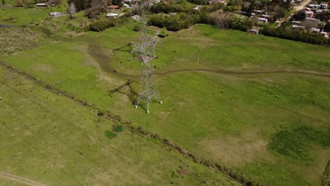 Transmission-tower-in-countryside,-Buenos-Aires