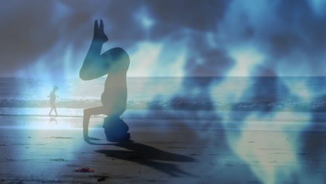 person doing headstand on beach with blue abstract animation overlay