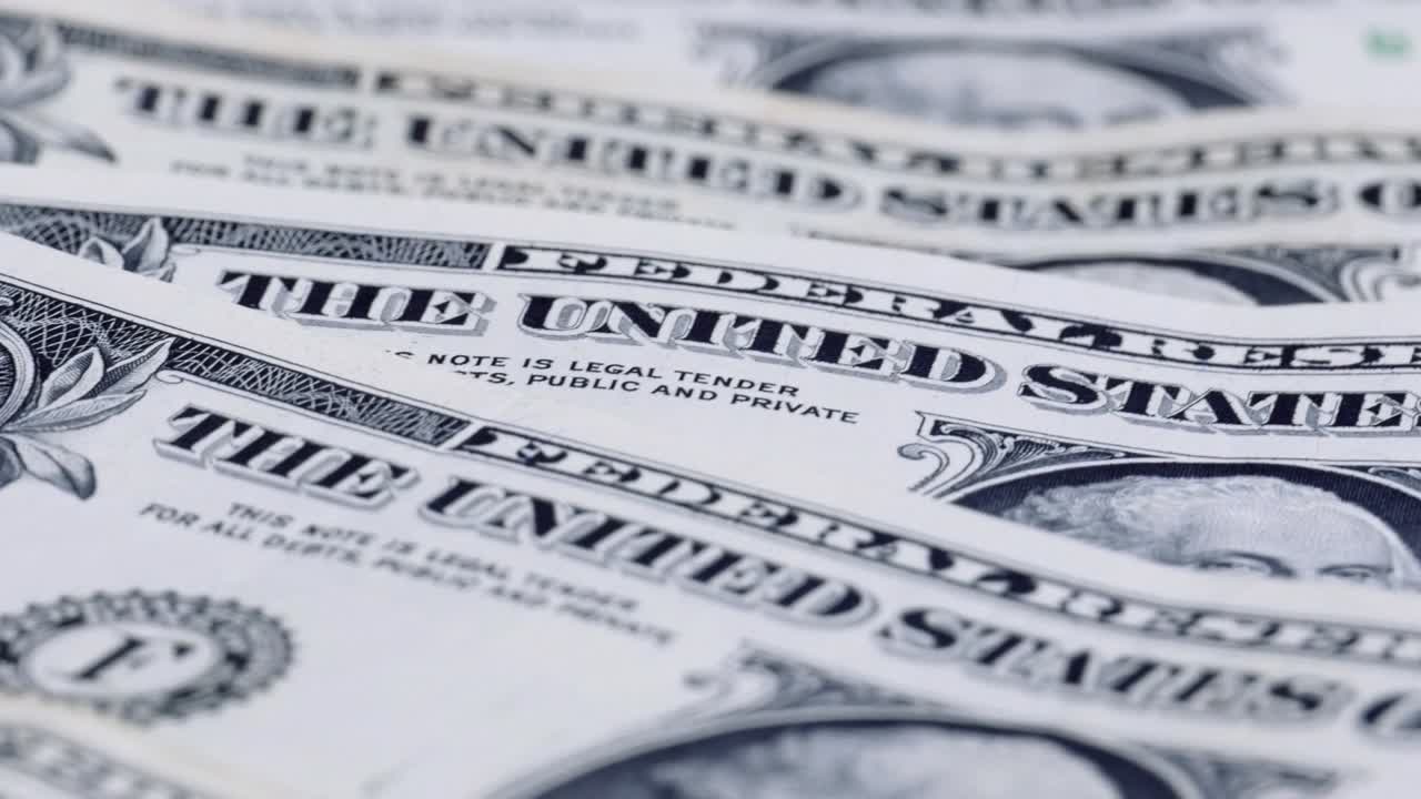 Banconote americane da 1 dollaro che ruotano.