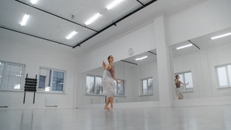 ballet dancer practicing in a dance studio
