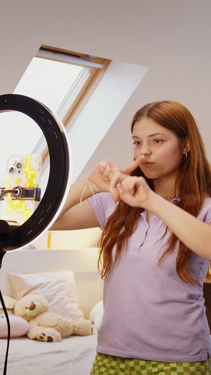 Teenager Making a Video with Ring Light