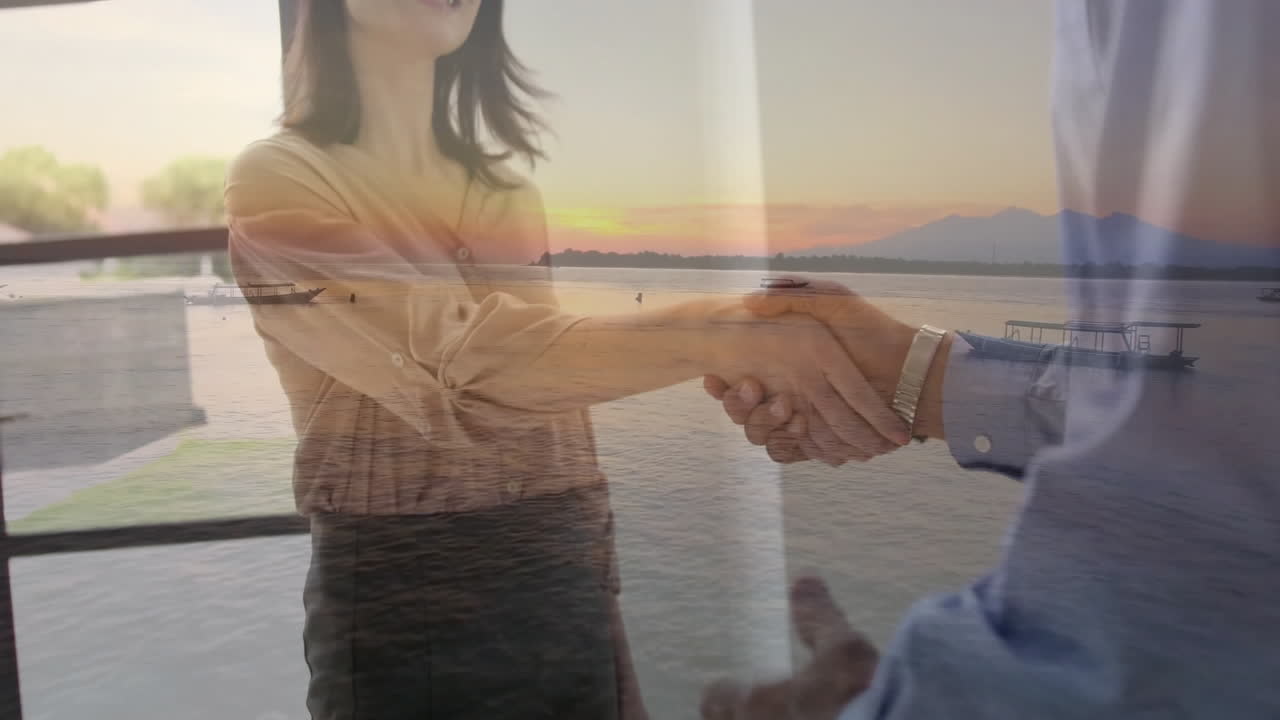 Shaking hands over serene lake, two people connecting during sunset animation