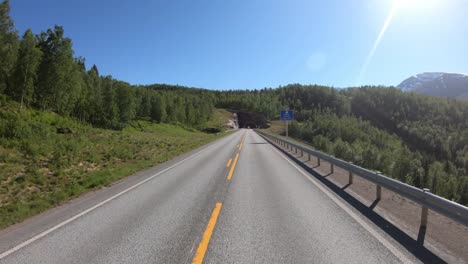 vehicle point-of-view driving a car on a road in norway