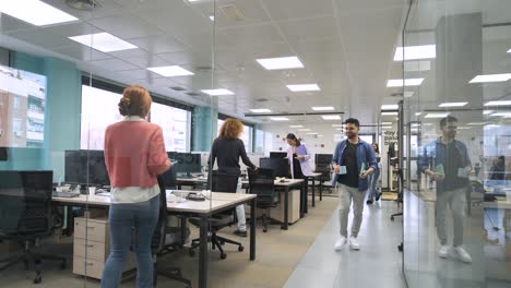 happy diverse colleagues entering creative workspace
