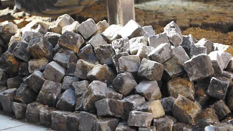 pile of paving stones for road work