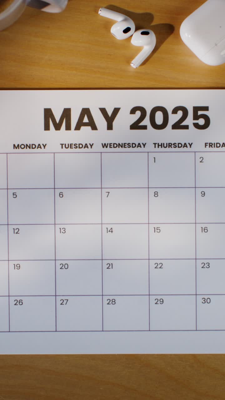 Woman Planning in May 2025 Calendar