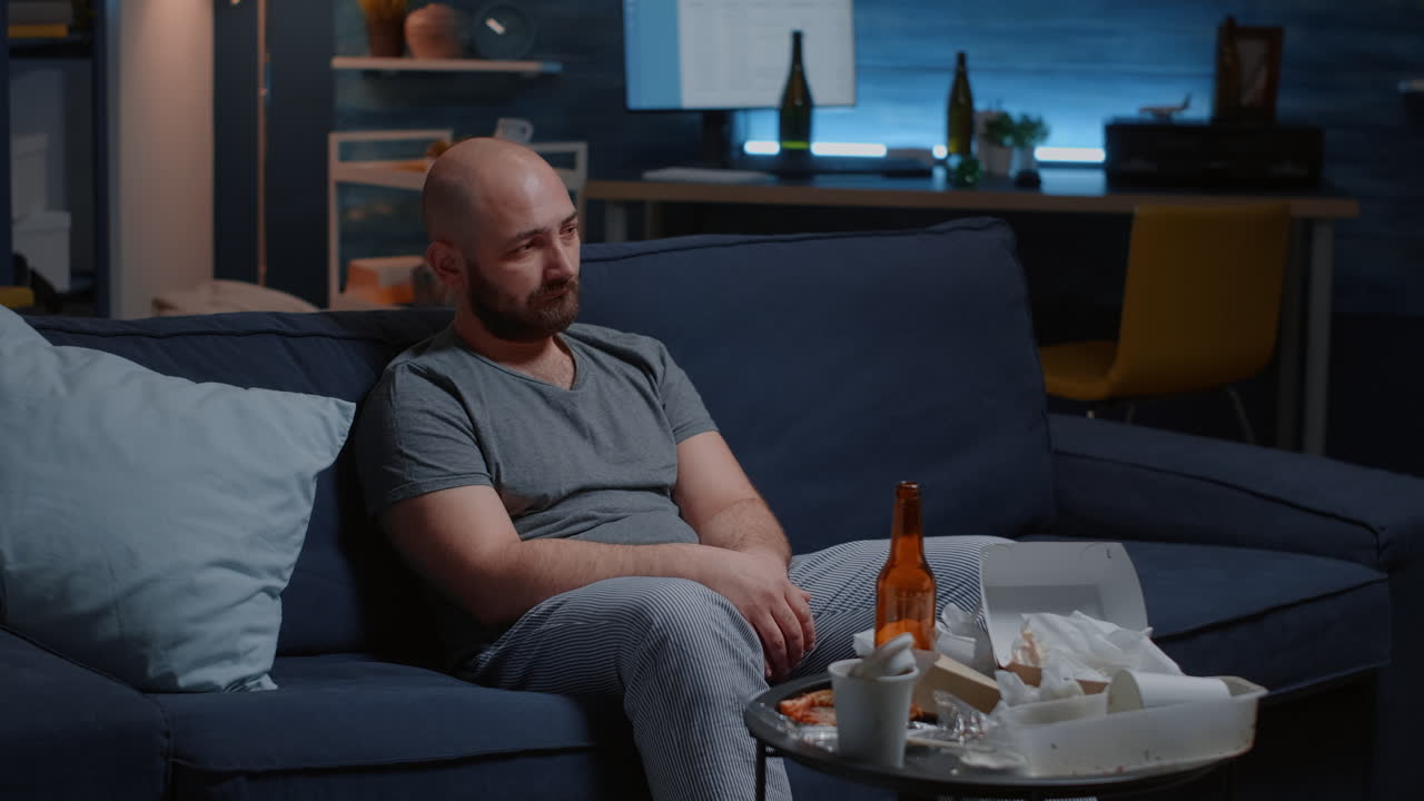 Frustrated depressed male with tears looking at camera lost