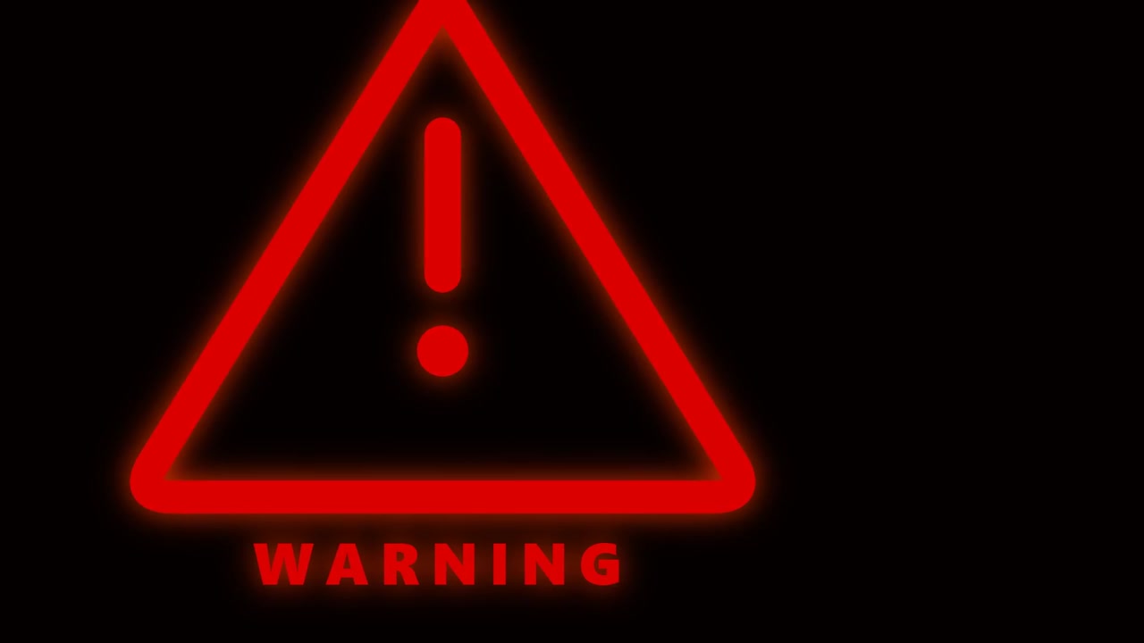Glowing Red Warning Sign with Exclamation Mark on Black Background