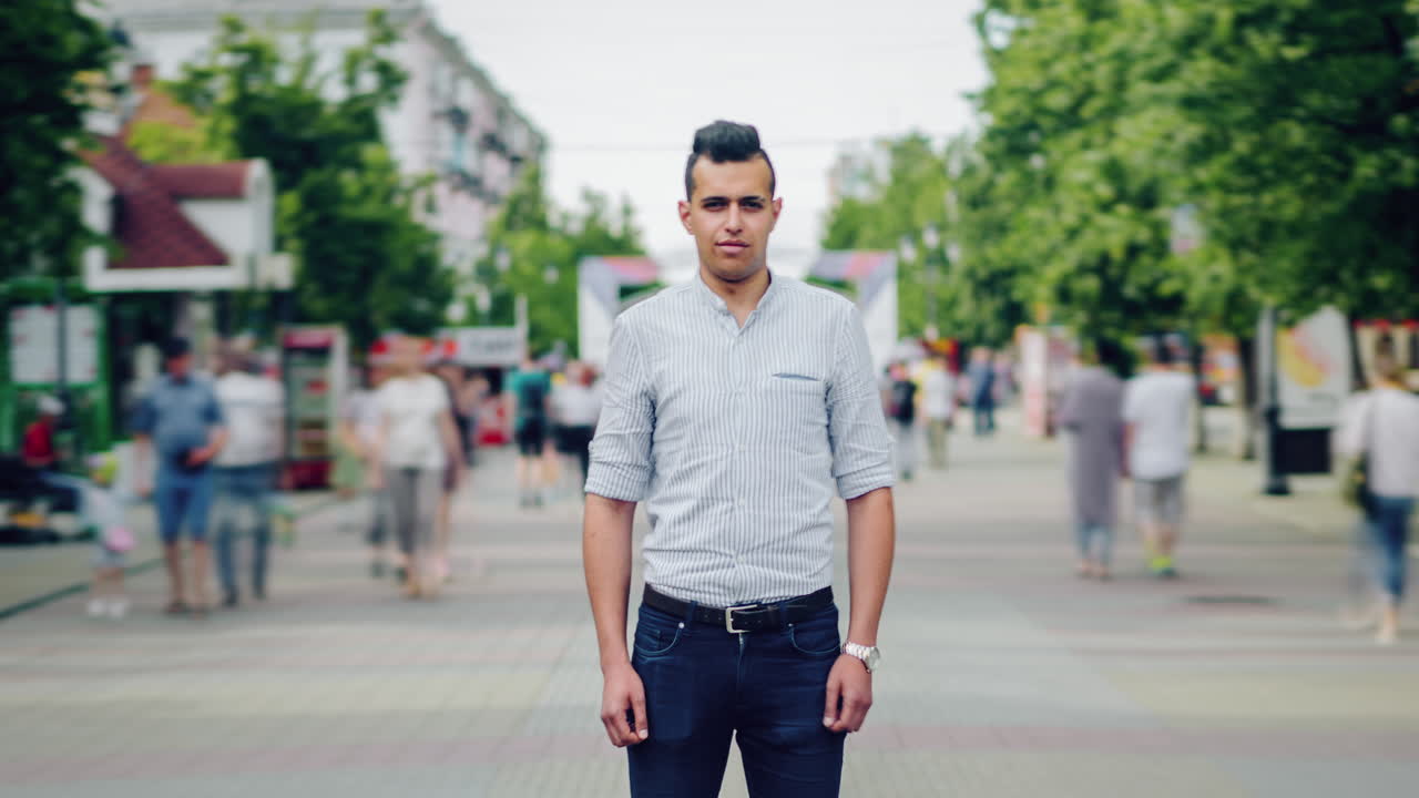 Man standing on a city street