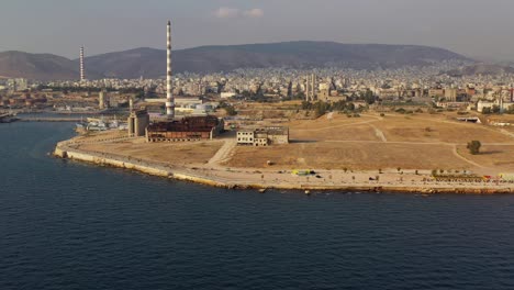 Aerial---General-shot-of-the-abandoned-factory-in-Drapetsona