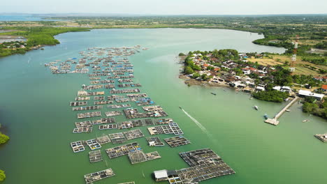 Aerial-flyover-Lobster-farms-on-Gili-batuputik-during-sunny-day-in-Indonesia