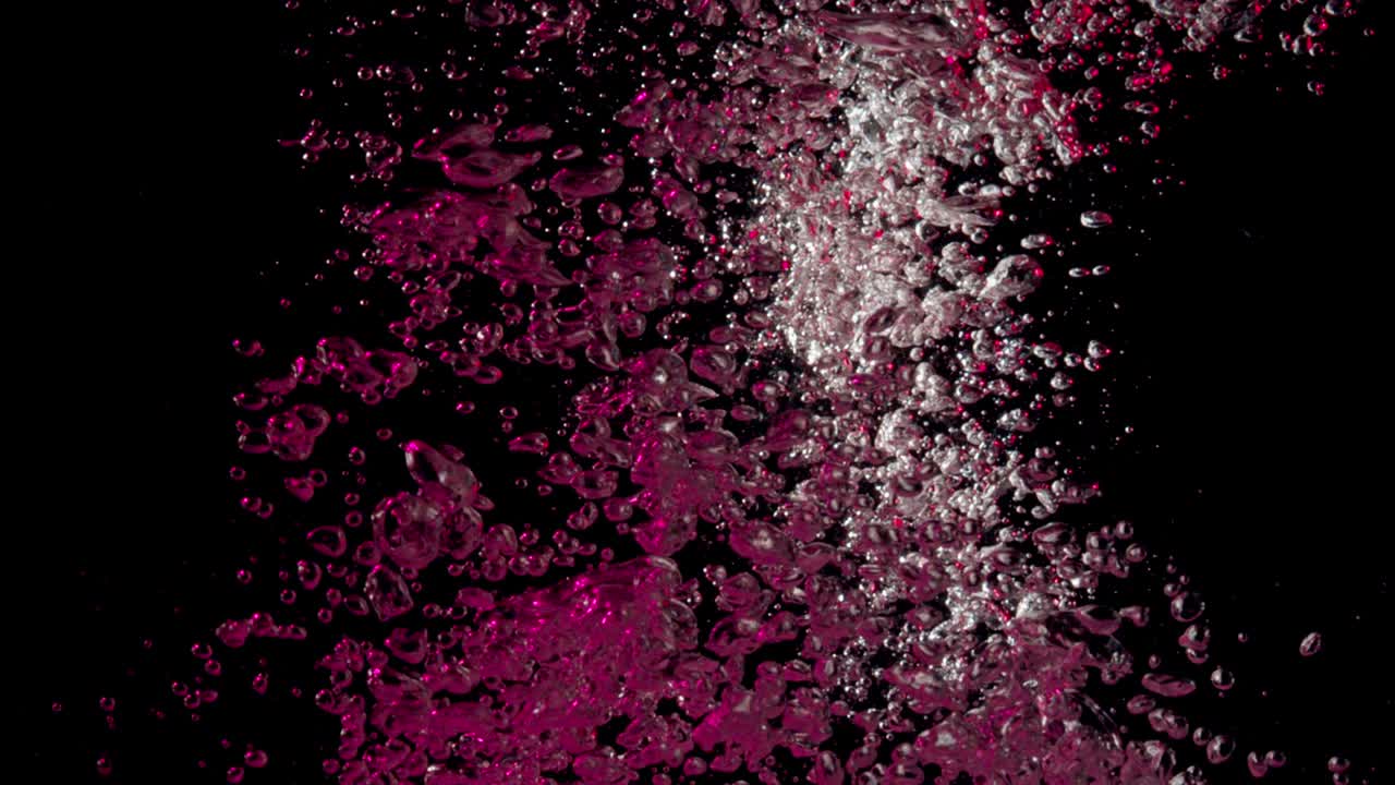 burbujas rosadas que se sumergen