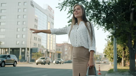 businesswoman waiting for a taxi
