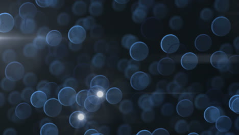 animation of blue circles and shiny bokeh