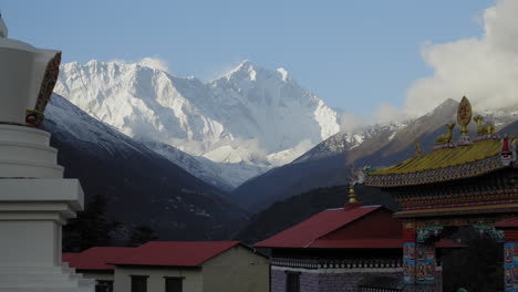 gliding shot of mount lhotse from tengboche monastery grounds