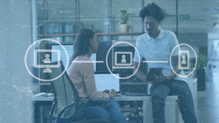 Animation of icons and data processing over diverse business people in office