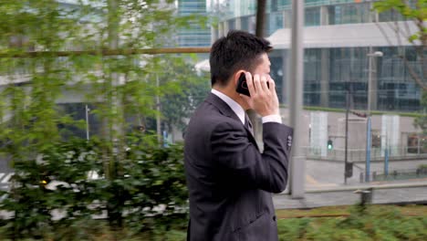 japanese businessman talking on a cell phone