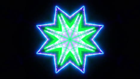 flor verde y azul con fondo negro y centro azul. ciclo de kaleidoscopio vj