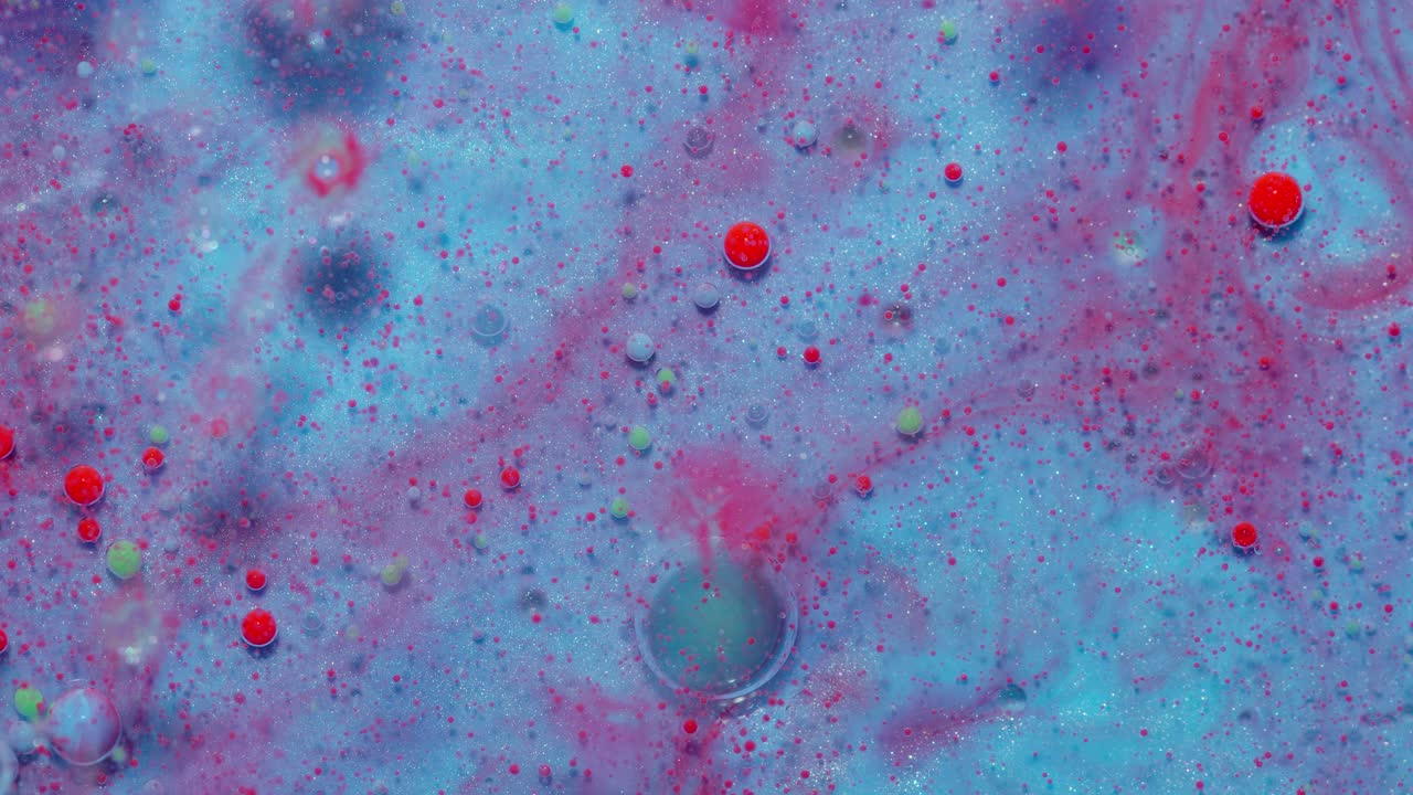 arte fluido abstracto azul y rosa con burbujas rojas