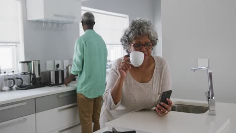 A-senior-African-american-couple-spending-time-together-at-home.-Social-distancing-in-quarantine.