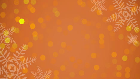 animation of christmas snowflakes and glowing spots on orange background