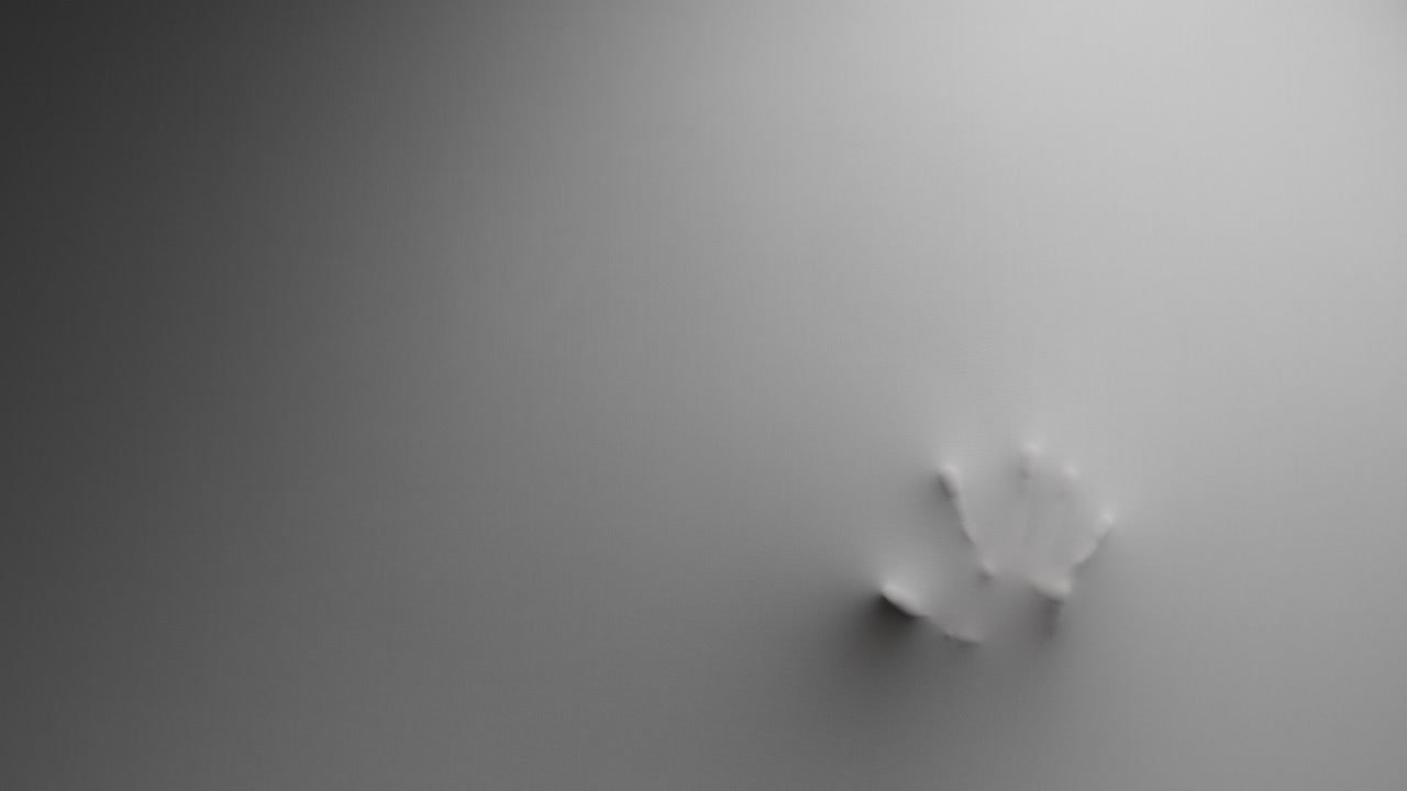 Scary hands silhouettes appear from the white wall