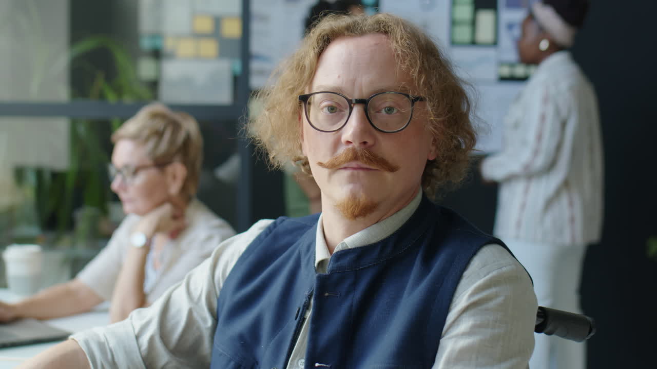 Portrait of Businessman in Wheelchair