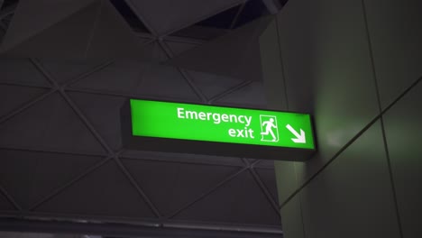 Emergency exit sign in an airport