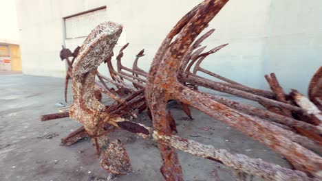 old rusted ship wreckage outdoors, anchors points, a silent testament to the passage of time and the corrosive touch of salt-laden air